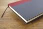 Preview: Diary with 160 blank pages, black hard cover, wine-red linen spine, headband